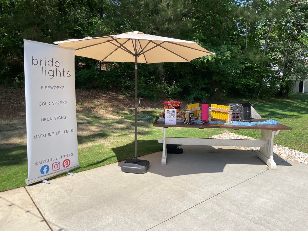 The booth set up for Bride Lights at Ivy and Oak Wedding Venue!