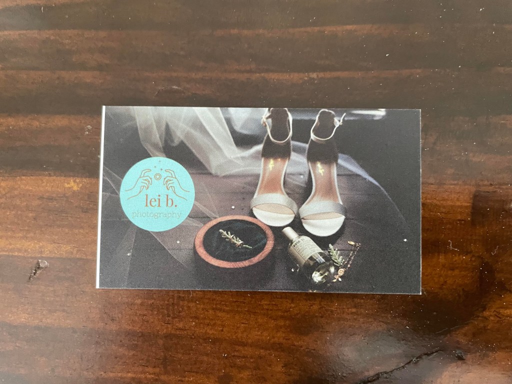 The front of the business card for Lei B. Photography 