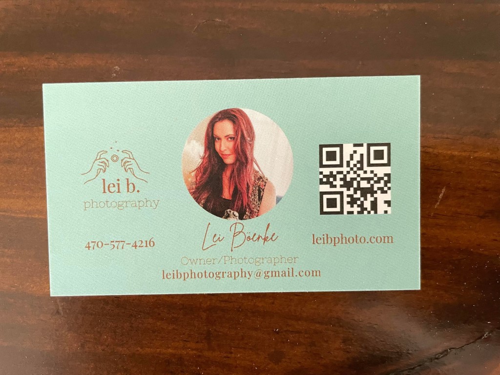 The back of the business card for Lei B. Photography