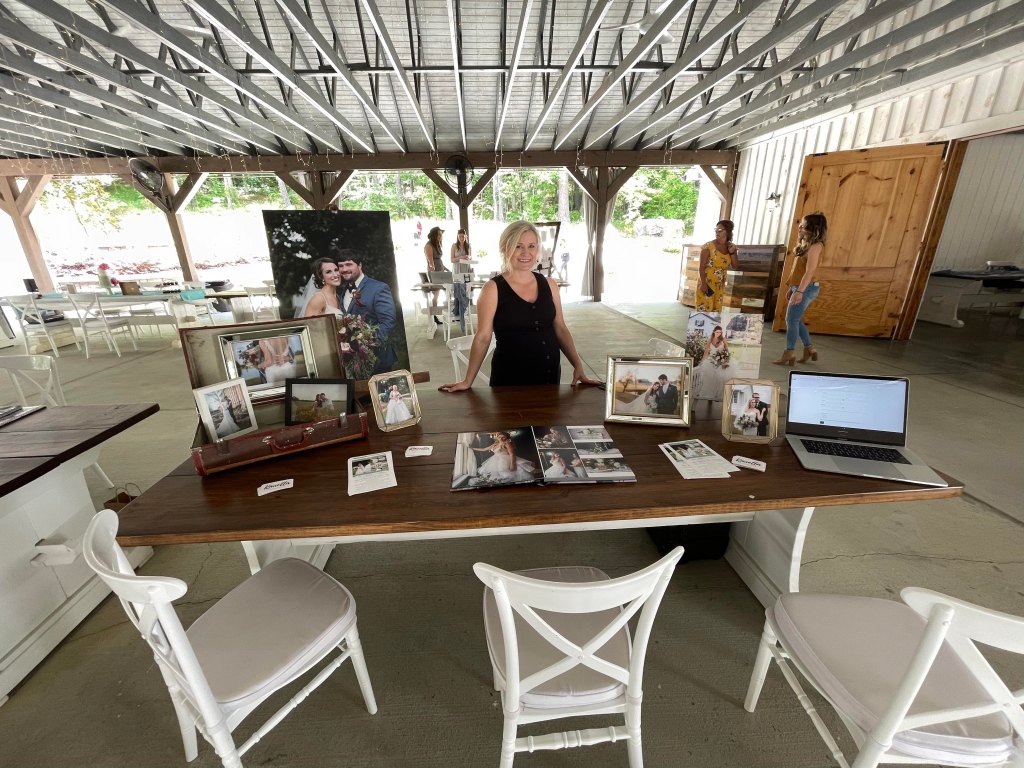 The booth set up for Kanella Photography along with Kanella herself!